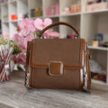 Elegant Classic Pink Women's Handbag with Metallic Details