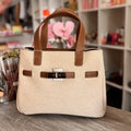 Classic Luxury Women's Handbag with Contrast Leather Trim & Metallic Lock