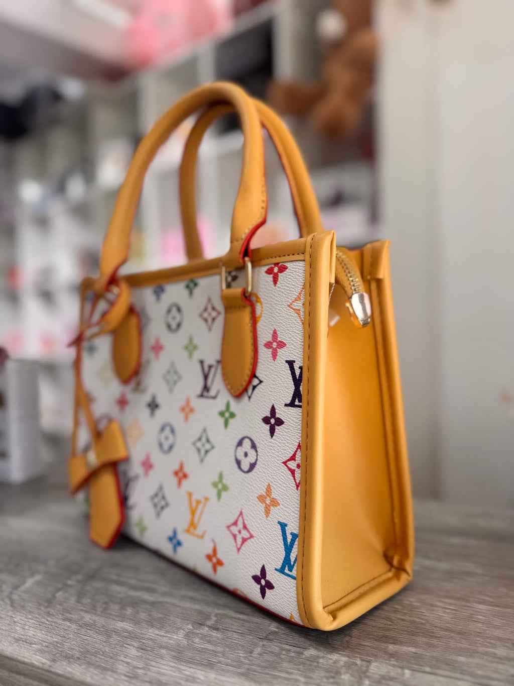 LV Classic Monogram Women's Handbag with Black Trim & Chic Bow Charm