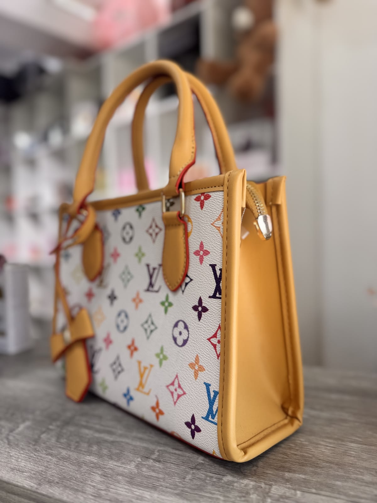 LV Classic Monogram Women's Handbag with Black Trim & Chic Bow Charm
