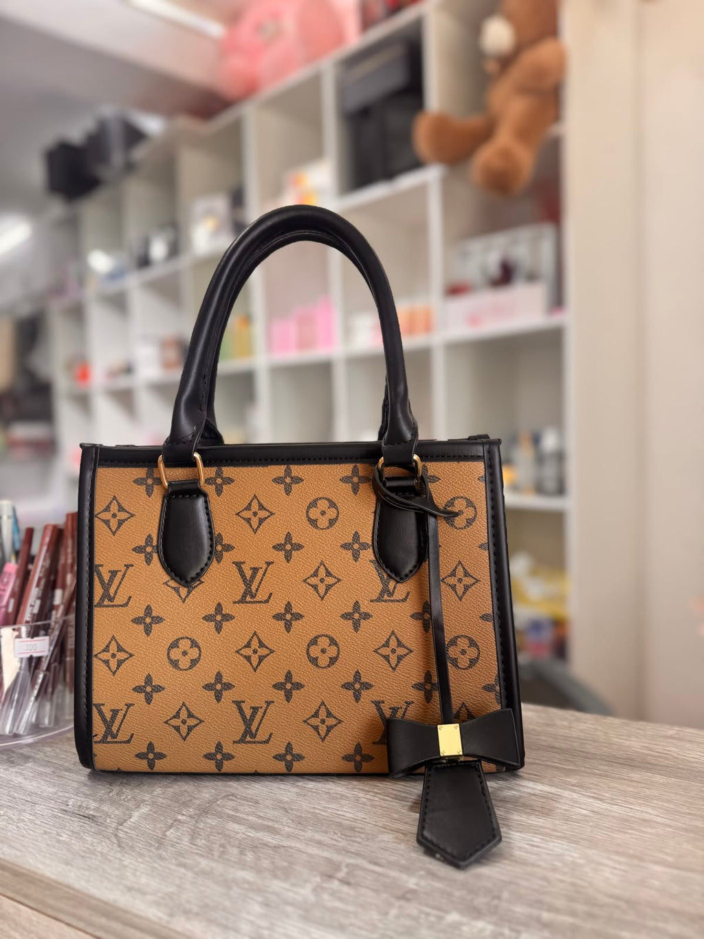 LV Classic Monogram Women's Handbag with Black Trim & Chic Bow Charm